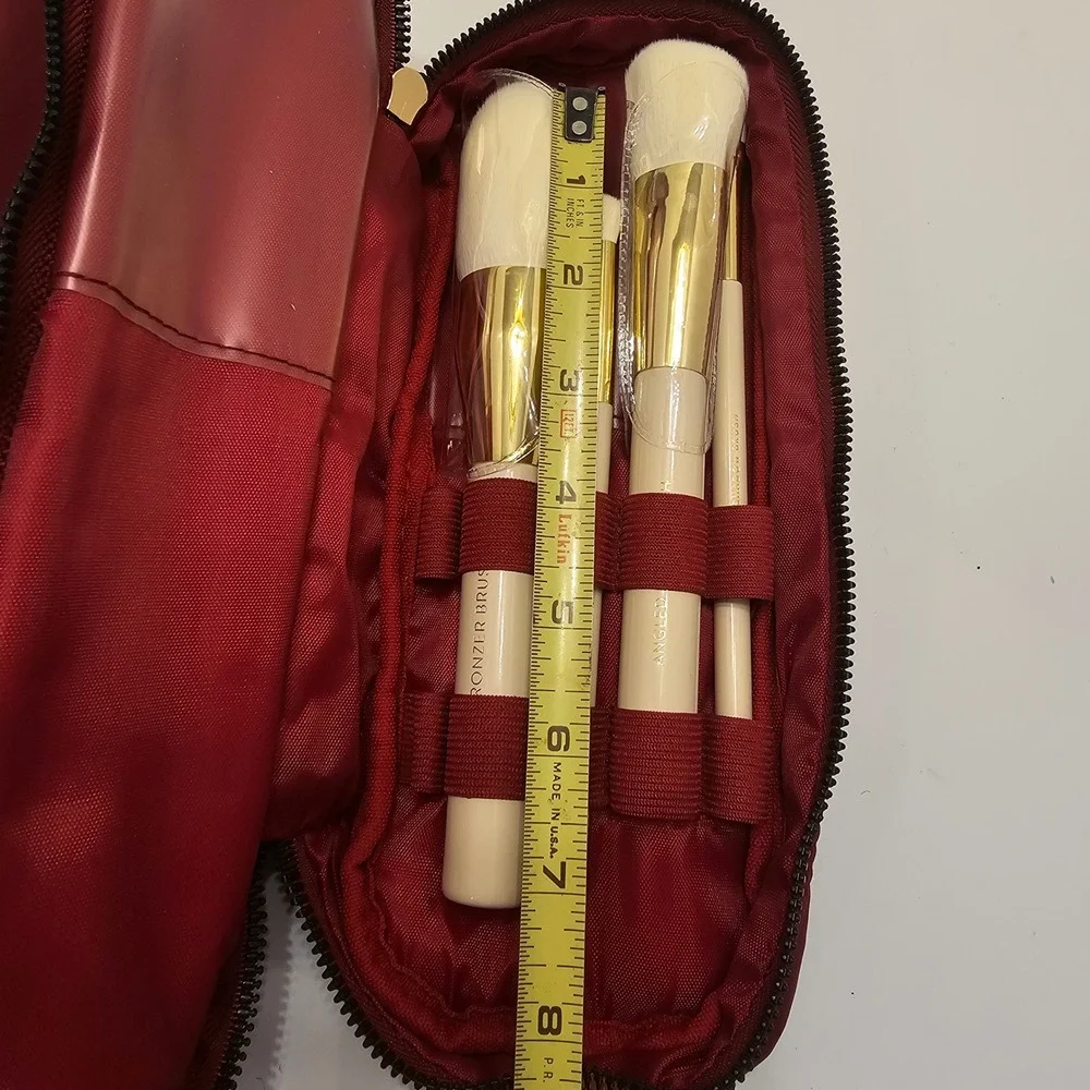Laura Geller Quilted Burgundy Makeup Bag and 4 Piece Professional Brush Set Gold